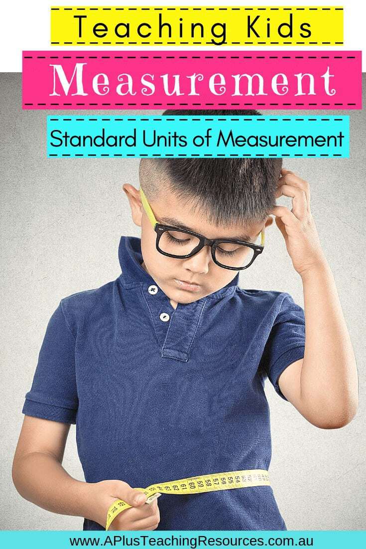 Teaching Standard Measurement boy using a tape measure to measure his waist