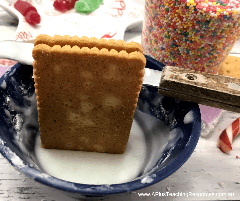 decorate the base of the gingerbread house